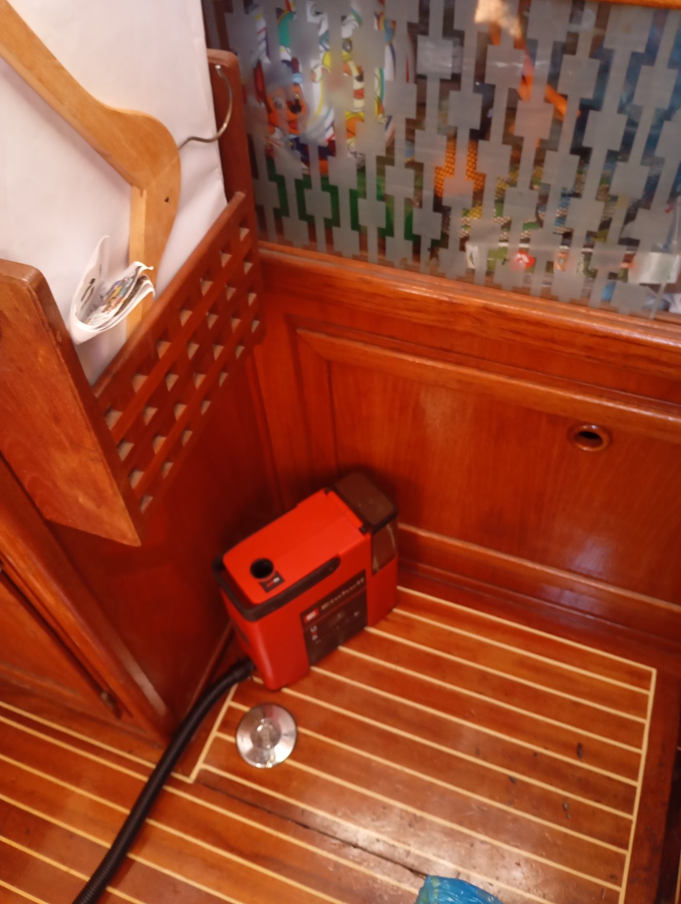 Electric SUP pump on the cabin sole